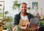 small business owner, florist, using a laptop