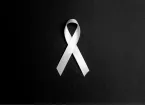 White ribbon on a black background 
