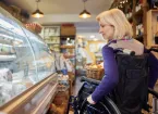 disabled shopper - wheelchair user in a shop 