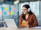 person at work looking at a laptop 