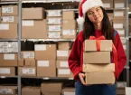 Warehouse worker wearing a Christmas hat 