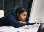 stressed female helpline employee