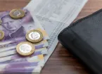 £20 notes, wallet and shopping receipt 