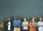 group of people using laptops 