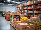 Warehouse with boxes of fruit and vegetables