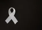 White ribbon on a black background 