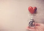 Jar of coins and heart - philanthropy 