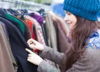 Woman choosing clothes at a market