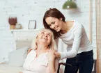 woman taking care of her disabled grandmother