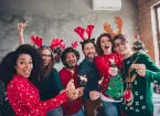 work colleagues wearing Christmas jumpers 