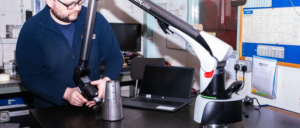 Cottam Brookes worker using Absolute Arm machine 