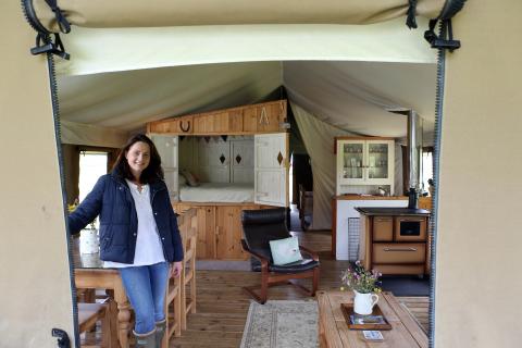 Wonderfully Wild owner, Victoria Roberts, in a luxury glamping tent.