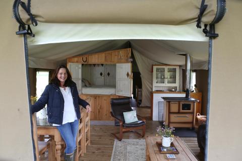 Wonderfully Wild owner in a luxury glamping tent.
