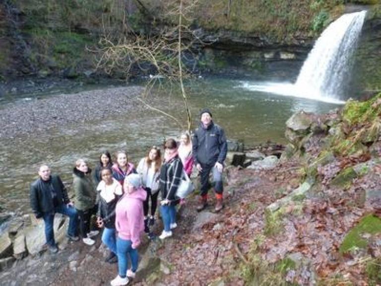 students at waterfall thanks to Bay Trans