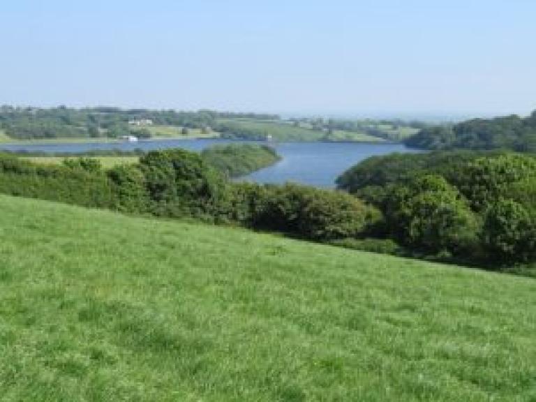 image of pembrokeshire countryside with lake inthe background