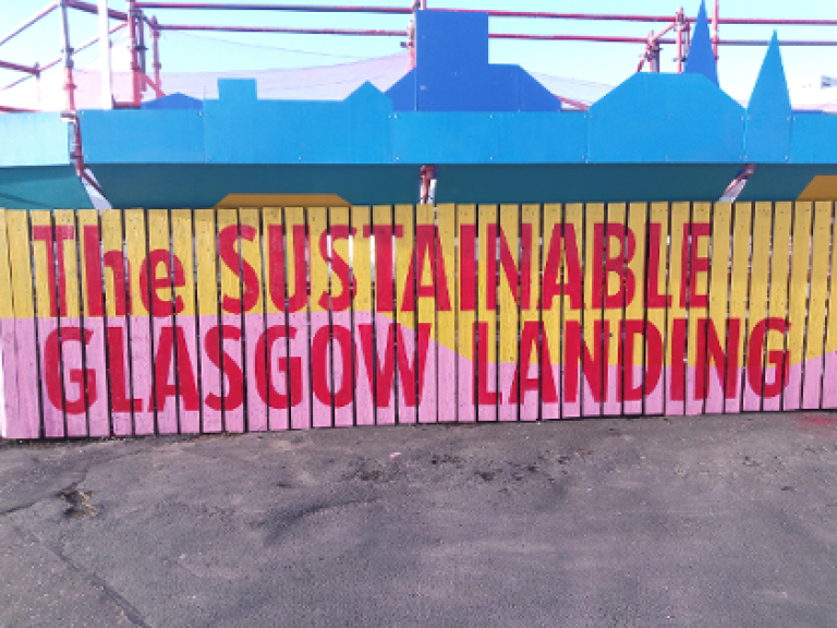 painted wall with The Sustainable Glasgow Landing spelled out