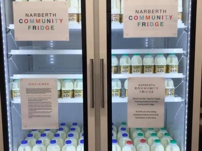 image of fridge with milk inside