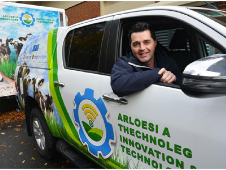 Rhys Webb inside one of the Innovation branded Vehicles